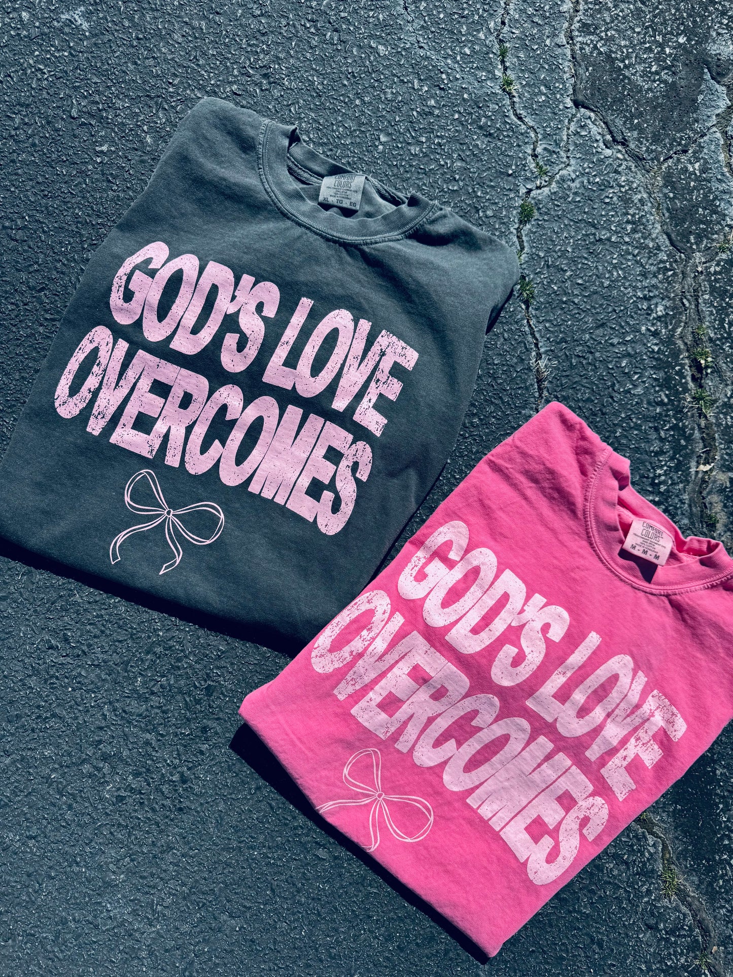 God's Love Overcomes graphic tee
