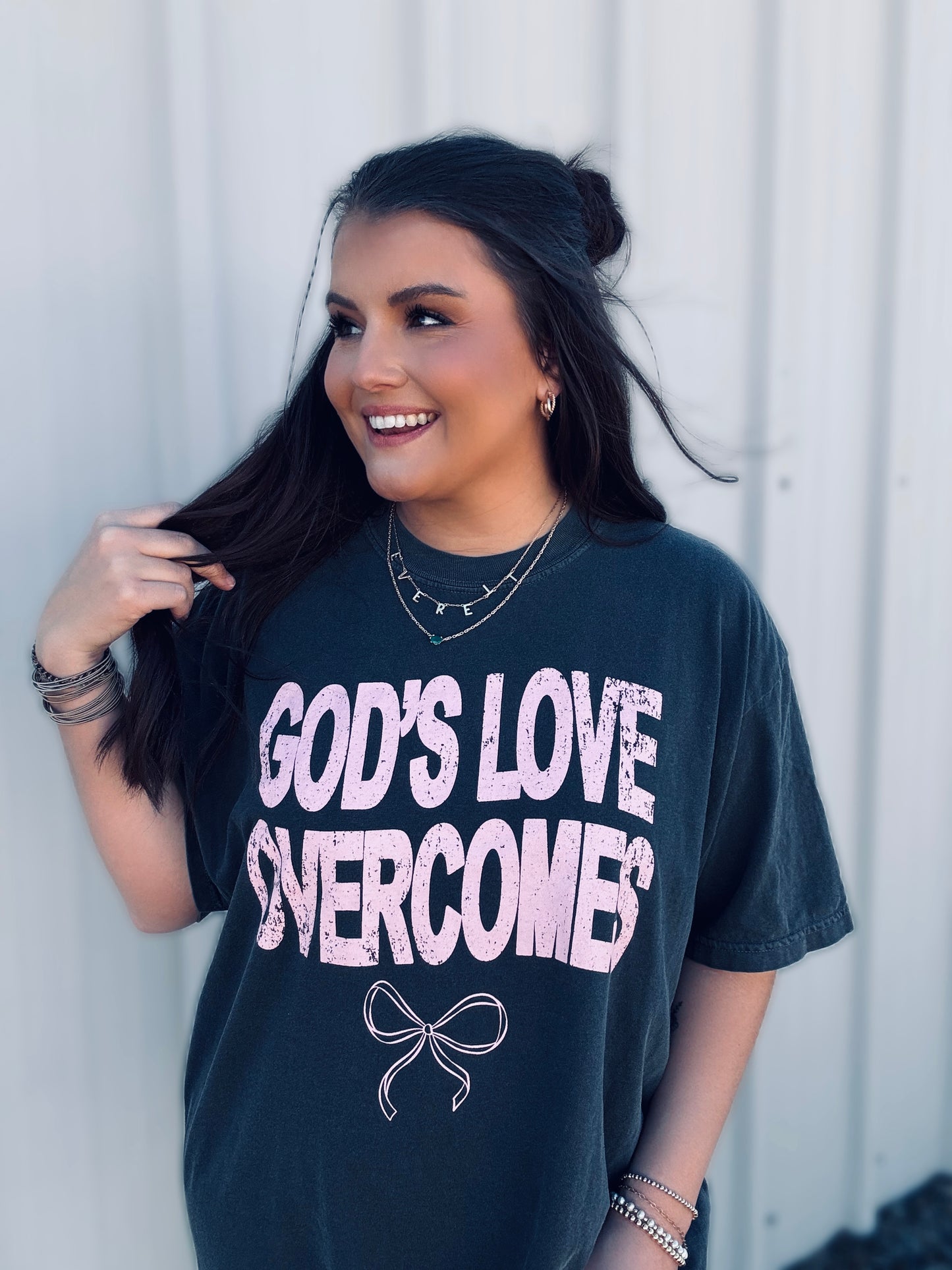 God's Love Overcomes graphic tee