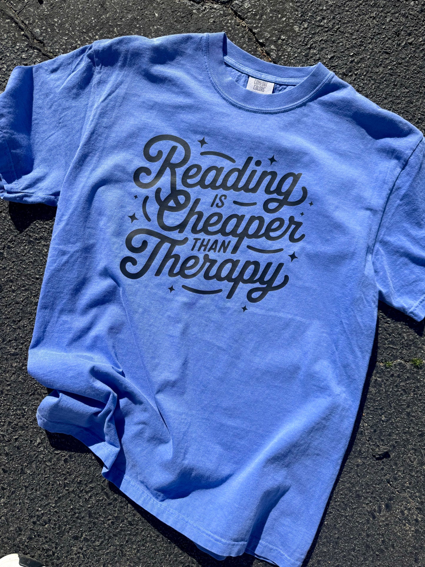 READING IS CHEAPER THEN THERAPY T-SHIRT | PERIWINKLE
