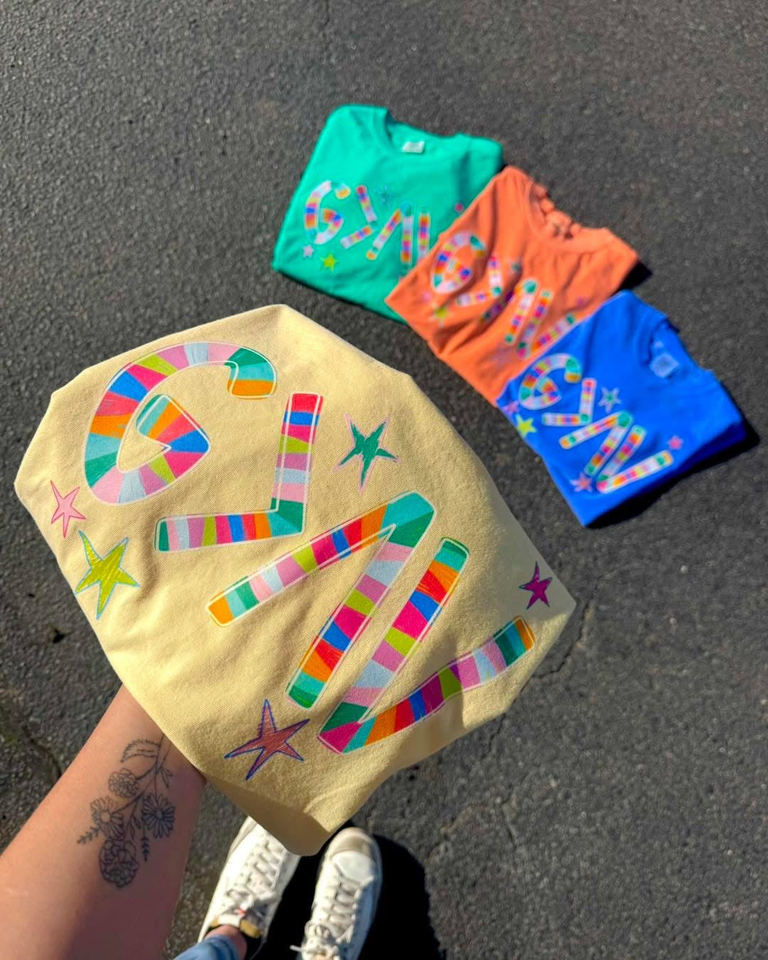 GOD IS GREATER THAN THE HIGHS AND THE LOWS GRAPHIC TEE | COLORS