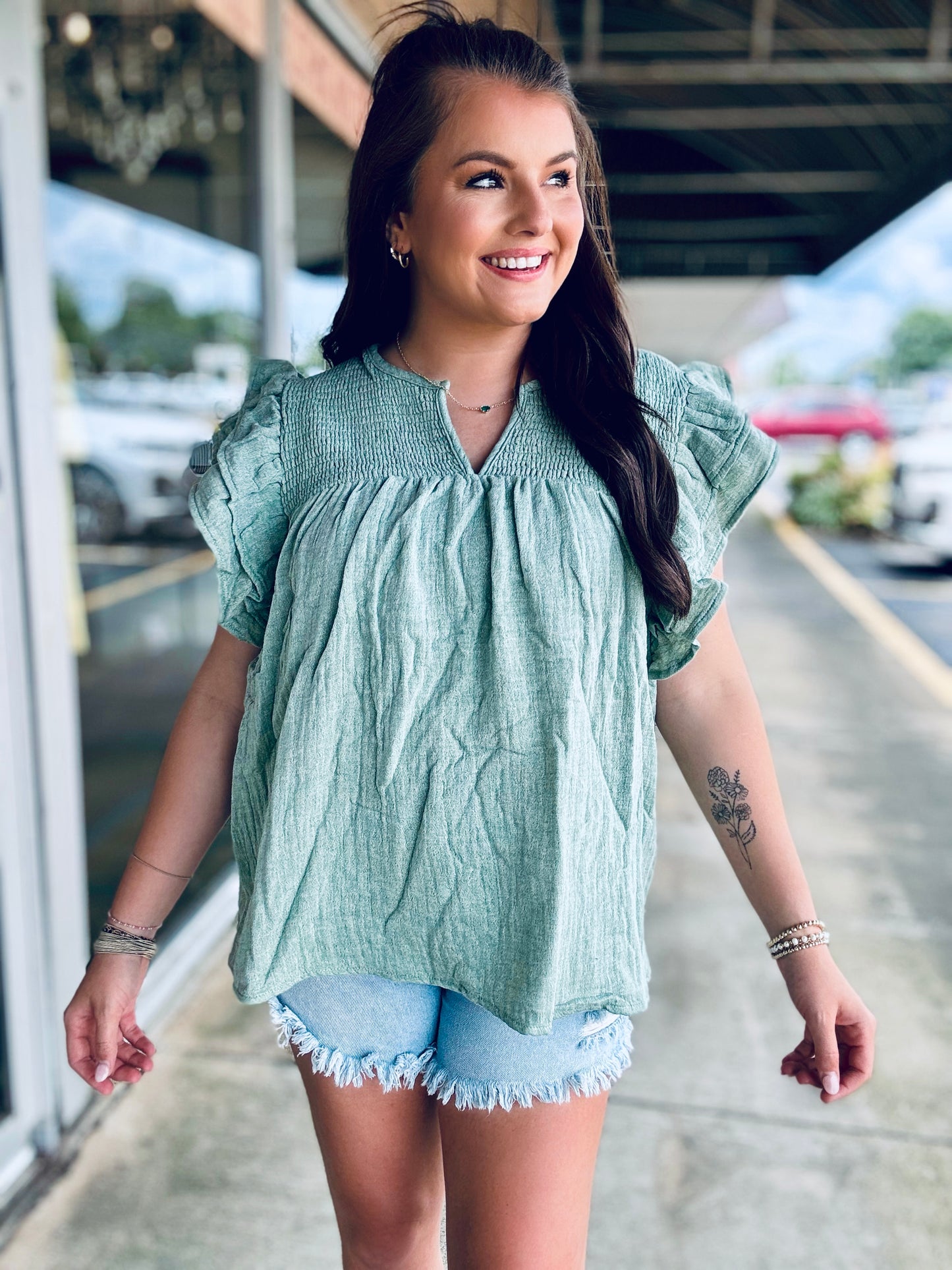 Going places green ruffle sleeve top